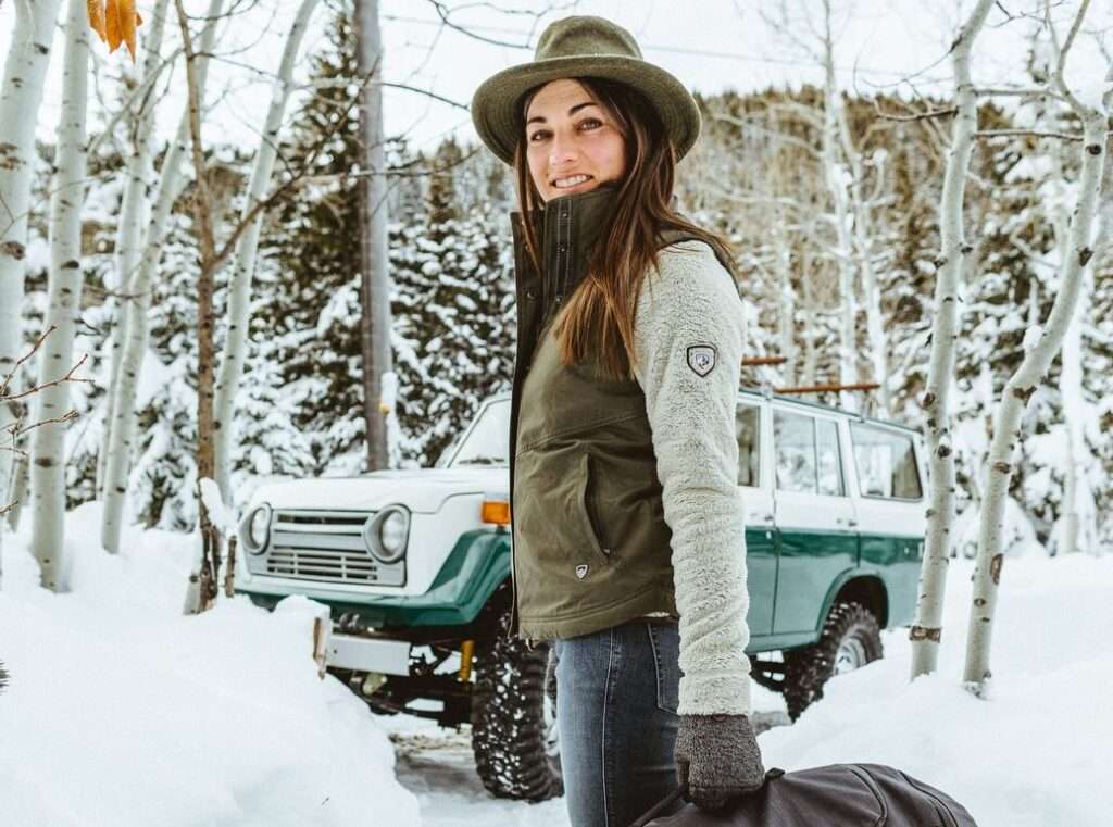 Portrait of Lindsey Davis in a snow landscape. Lindsey is an entrepreneur and ecologist who uses renewable microgrids to power her off-grid adventures. Source: Goal Zero.