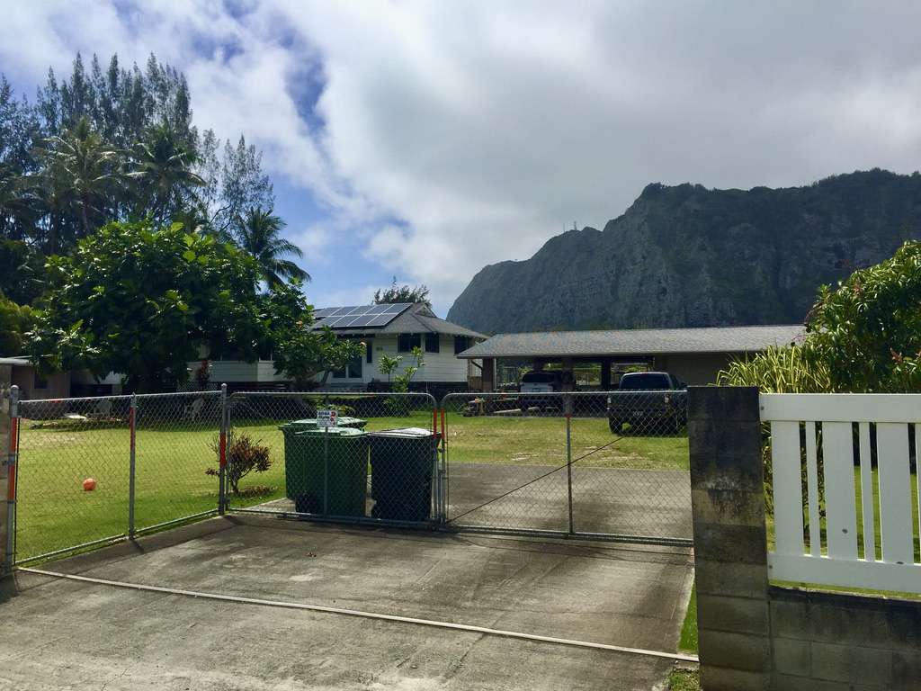 Home with solar panels on roof in Hawaiian town of Waimanalo, on the island of Oahu.